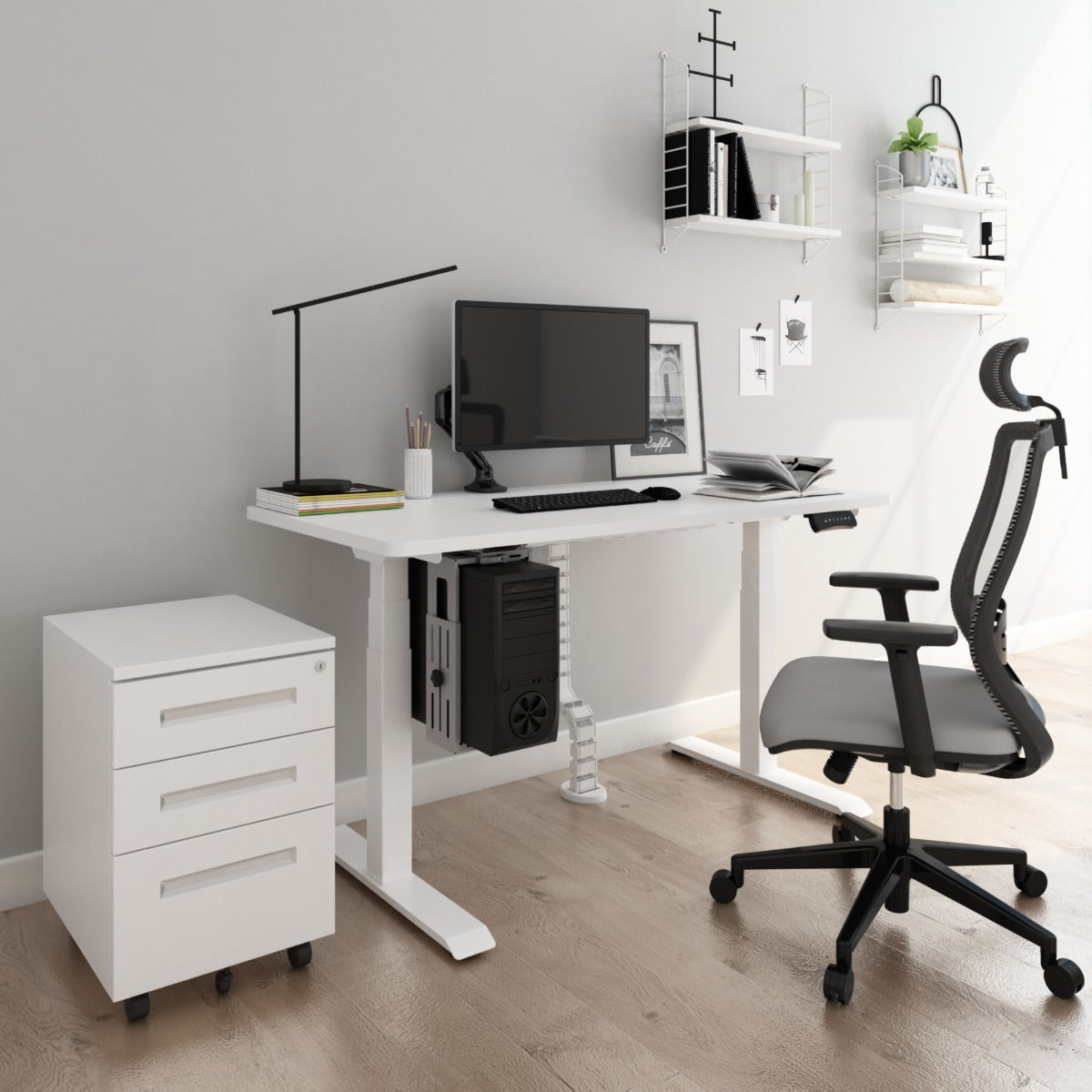 An adjustable desk with a lot of accessories