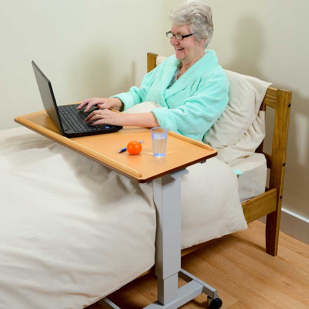 NRS Healthcare Easylift Overbed / Chair Table - Wheelchair Version