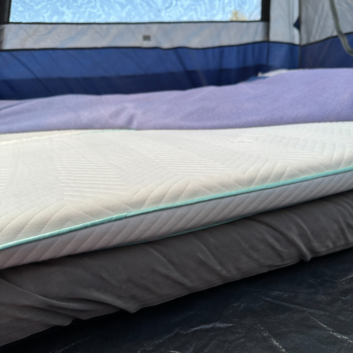 A side on view of the product in a tent